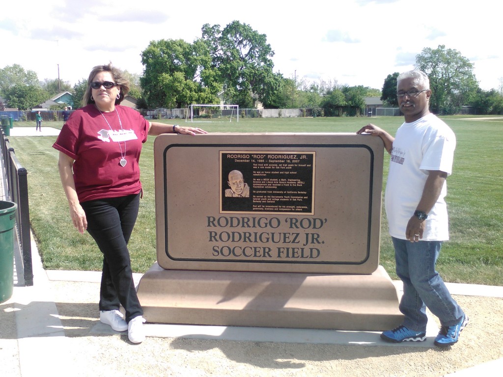 Rod's parents next to monument 